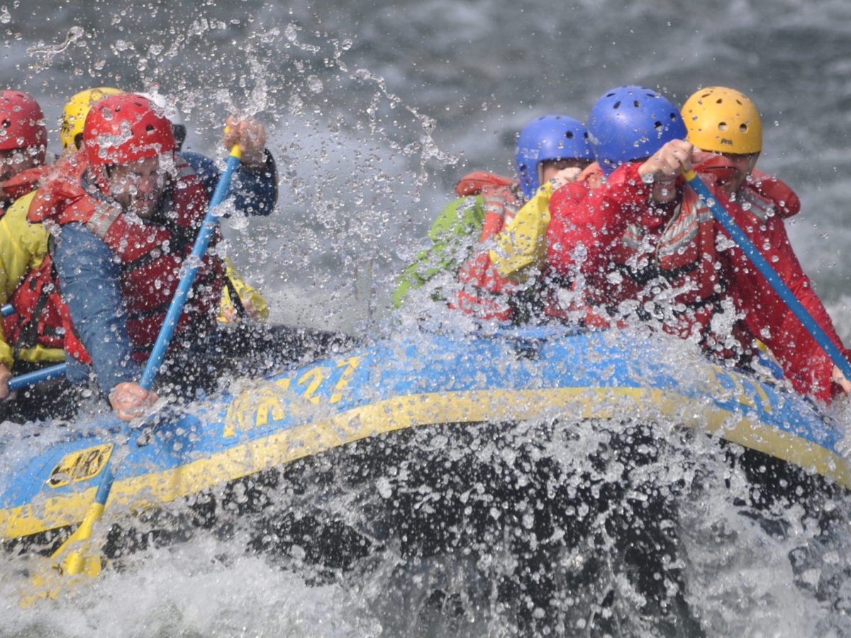 a group of people whitewater rafting in washington on the wenatchee river
